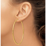 Indlæs billede til gallerivisning 10K Yellow Gold Extra Large 70mm x 1.5mm Endless Hoop Earrings
