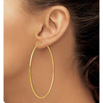 Indlæs billede til gallerivisning 10K Yellow Gold Extra Large 68mm x 2mm Endless Hoop Earrings
