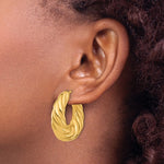 Load image into Gallery viewer, 18K Yellow Gold 29mm x 10mm Twisted Graduated Hoop Earrings
